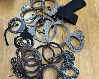 Lot #92 Large Lot of Vintage Metal Handcuffs, Leg Irons, and Chains Collectibles