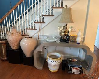 Laminate console table and floor vases