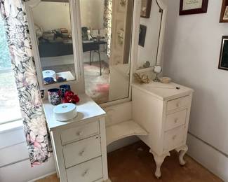 white vintage French-style vanity dressing table featuring a triptych mirror
