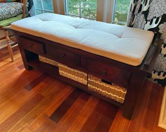 Padded bench with storage