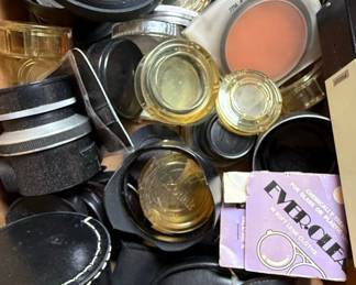 Assorted Camera Lenses, Filters, and Accessories