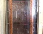 Vintage bow front glass cabinet