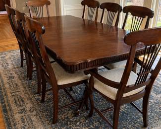 Pedestal dining table with 8 chairs and extensions by Canadel