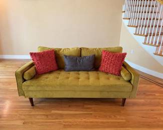 Decorator style sofa with tufted full seating