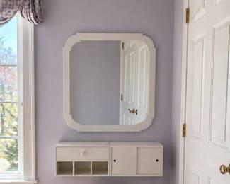 Wall  vanity station. Inches wall mirror,  floating shelf with storage.