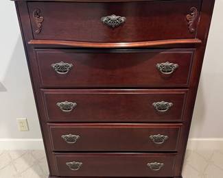 Five-drawer highboy dresser.