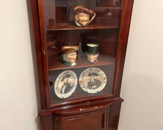 Vintage mahogany and glass corner cabinet.