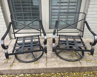 Pair of metal patio chairs.