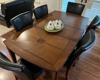 Dining table with six chairs.