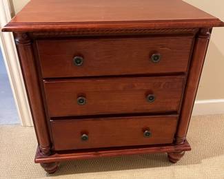 Compact three-drawer chest.