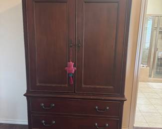 Beautiful armoire set with matching dresser.