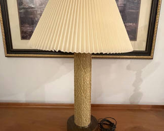 Lot 27: mid-century modern style table lamp featuring a textured, woven base