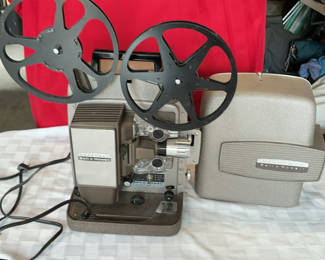 Lot 37: Vintage Bell & Howell Film Projector.