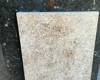 Lot 77: Two speckled granite slabs
