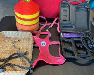 Lot 86: Pink dog harness with grooming kit and accessories