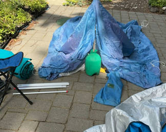 Lot 48: Camping Tent Setup with Poles and Gear