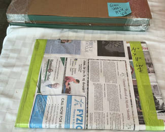 Lot 42: Stack of Glass Panels with Protective Edging