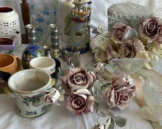 Lot 35: Assorted decorative home items: mugs, vases, candle holders, and frosted artificial roses