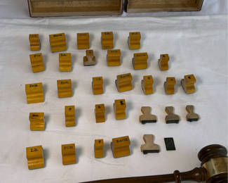 Lot 79: Gavel and vintage wooden stamping blocks with storage boxes