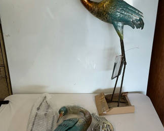 Lot 29: Pair Of Metal Herons And Windchimes New