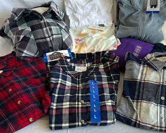 Lot 40: Assorted women's casual shirts, hoodies, and outerwear