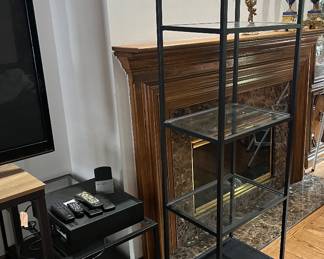 glass and black metal bookshelf, coffee table, media shelf, and side table