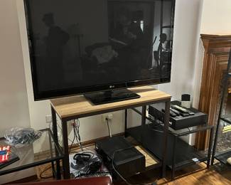 glass and black metal bookshelf, coffee table, media shelf, and side table