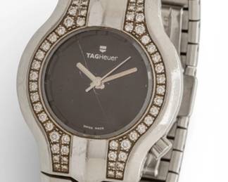 Lot 54 Tag Heuer Stainless Steel and Natural Diamond Women's Wristwatch 'Alter Ego', Dia. 6.25"