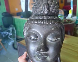  A remarkable pair of antique iron masks, believed to be 19th century, brought to the United States by a diplomat with extensive ties to East Asia. One is a fully three-dimensional demon/oni face with jade-green glass eyes and detailed etched features. The second is a flat iron mask with a fierce expression, jade-green glass eyes, and Chinese characters inscribed on the reverse, with a wire hanger. Both show beautiful age patina. Exceptional collector's pieces with genuine provenance.