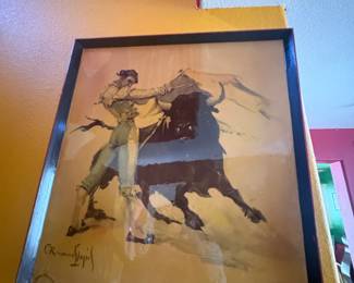 Signed Bullfighting Lithograph — Carlos Ruano Llopis (Spain/Mexico, 1878–1950) Framed signed bullfighting lithograph by listed Spanish artist Carlos Ruano Llopis (1878–1950), one of the most celebrated painters of bullfighting scenes. Dynamic composition depicting a matador and bull mid-fight, rendered in Llopis's signature loose, gestural style. Signed lower left