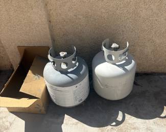 Two standard 20 lb propane tanks, both empty and ready for refill. Solid condition. Perfect if you need tanks for your grill or outdoor heater.