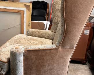 wing back chair with cherub tan print