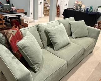 Light Green Upholstered Sofa with Accent Pillows by Jonathan Louis