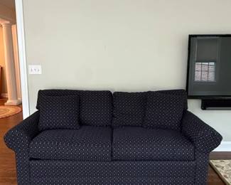 Blue Upholstered Sofa with Small Dot Pattern
