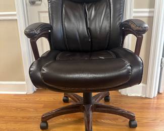 #34	Brown Pleather Office Chair - adjustable (has wear on arms)	 $20.00 