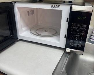 #57	West Bend Counter top Micowave -Working 	 $25.00 