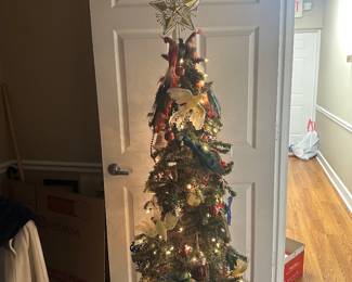 #56	Slim -Line 5 foot Christmas Tree on Stand w/decorations and Lights 	 $40.00 