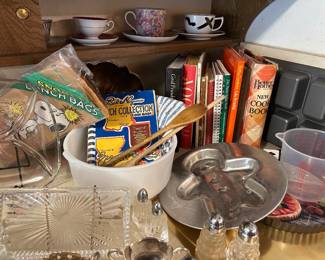 Kitchen tools, baking pans, cookbooks