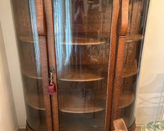 Antique Tiger Oak curved glass china cabinet