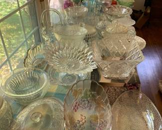 Two tables of clear and colored glass