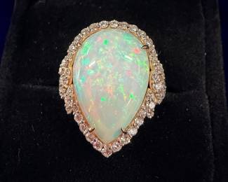 Very large opal with diamonds and gold