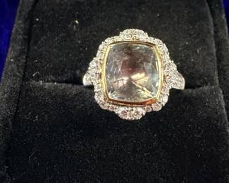 Multicolored sapphire, gold, diamonds, and platinum