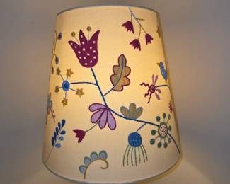 Alfhild Fagel lampshade with folk art embroidery.