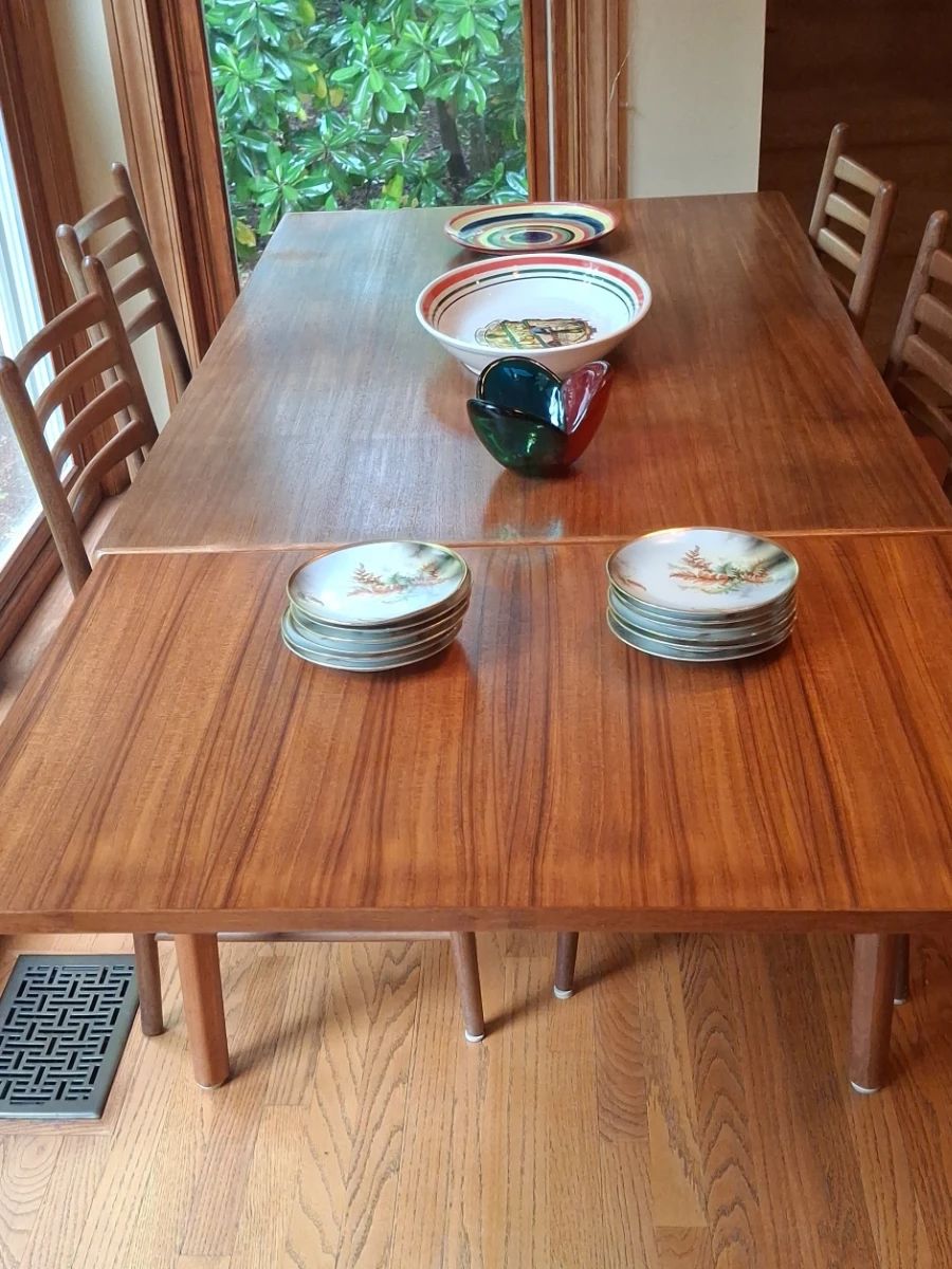 Danish Teak Extendable Dining Table with Chairs and Assorted Tableware