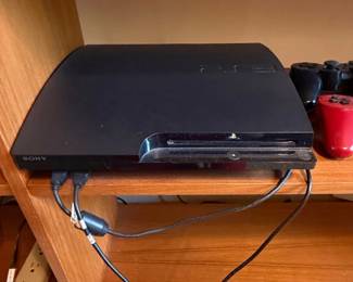 Sony PlayStation PS Slim Console with Two Controllers second image