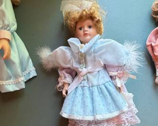 Collection of Three Porcelain Dolls second image