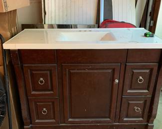 #104	Bathroom Vanity w/cultured marble top - 49x21x36	 $75.00 
