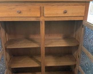 #8	oak and punched tin 2 drawer 2 door cabinet 42x14x53	 $125.00 