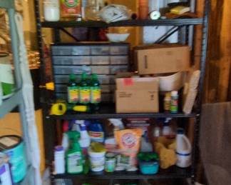 Metal Shelving Unit with Assorted Household Goods