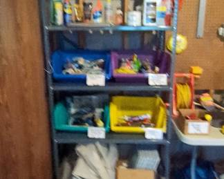 Metal Shelving Unit with Assorted Contents